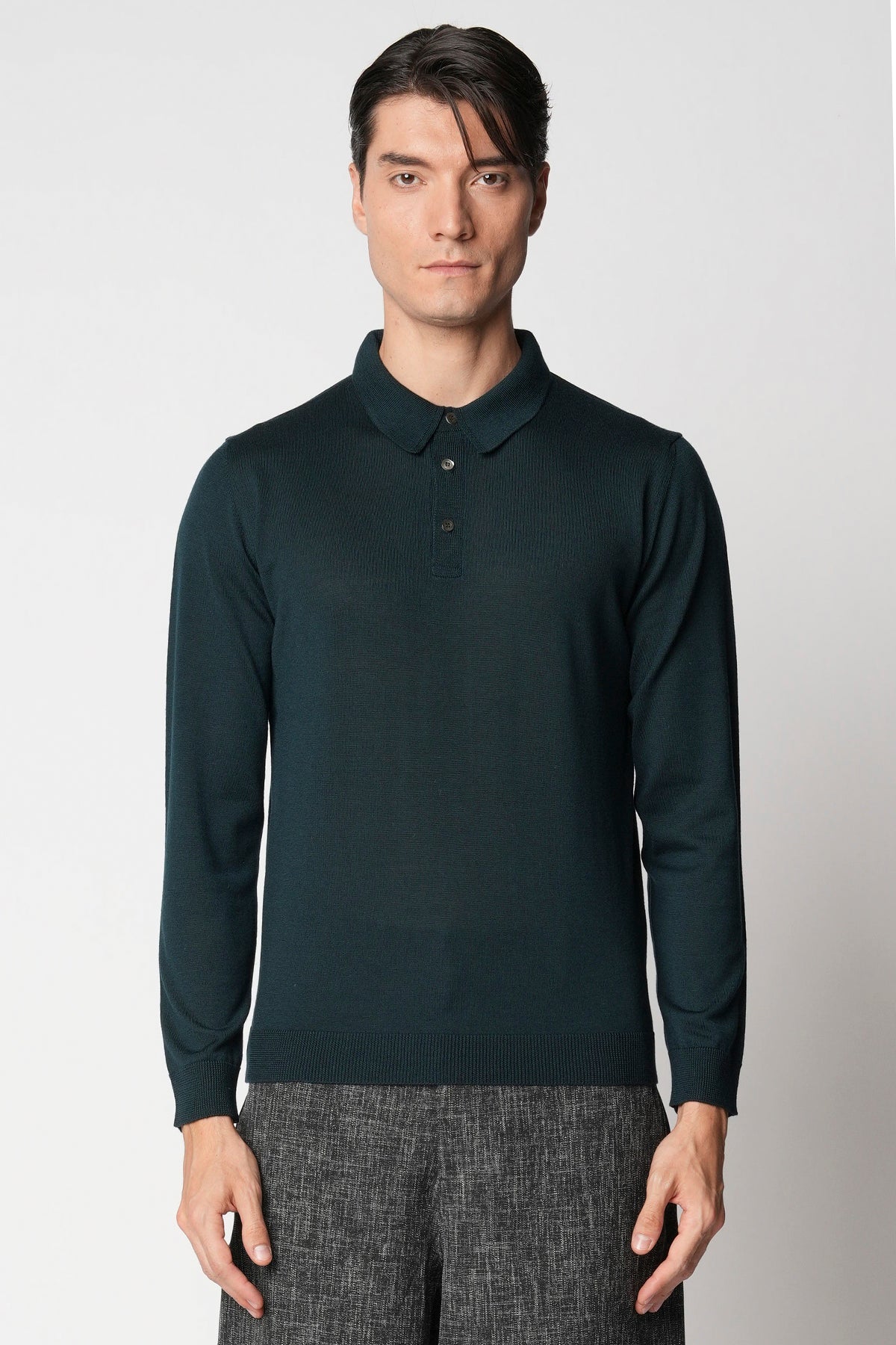Polo bottoni rasato in lana merino extrafine