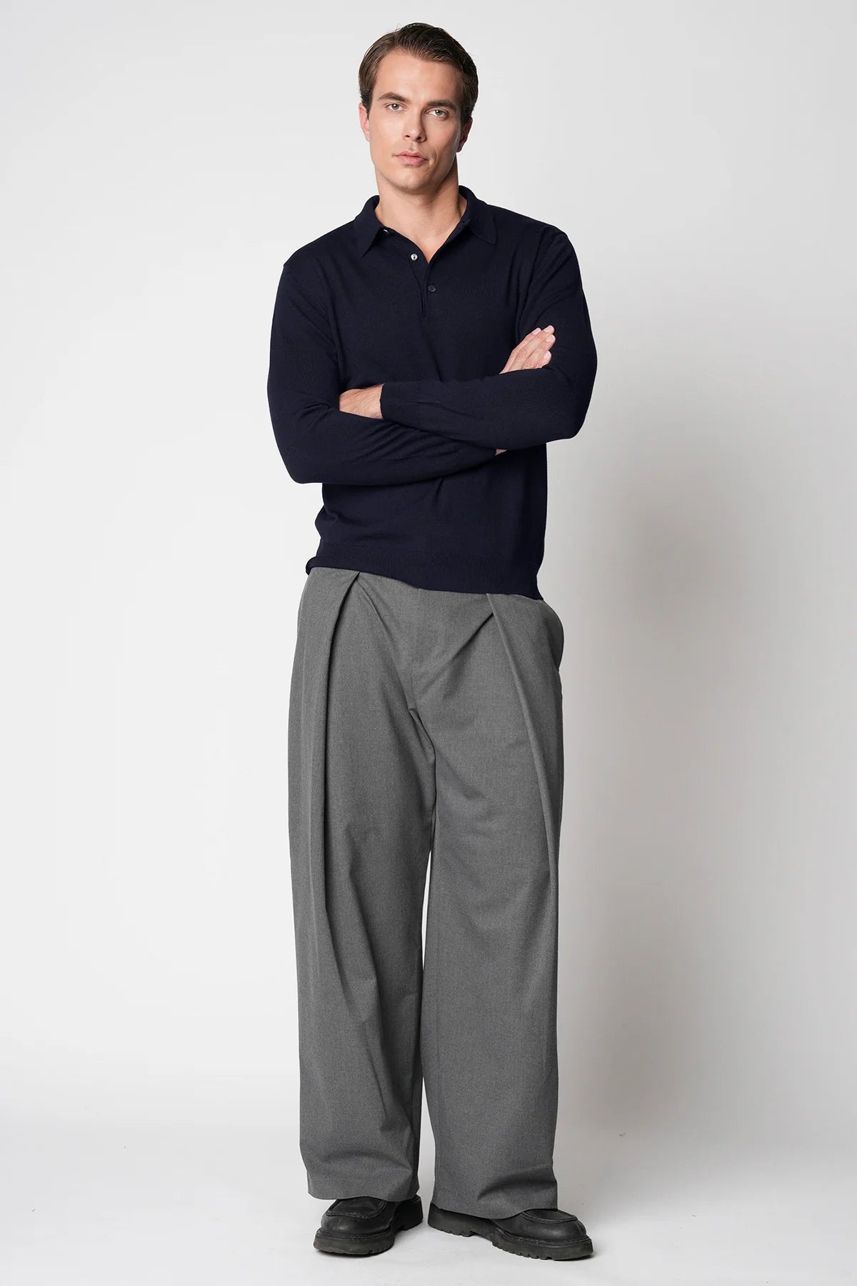 Polo bottoni rasato in lana merino extrafine