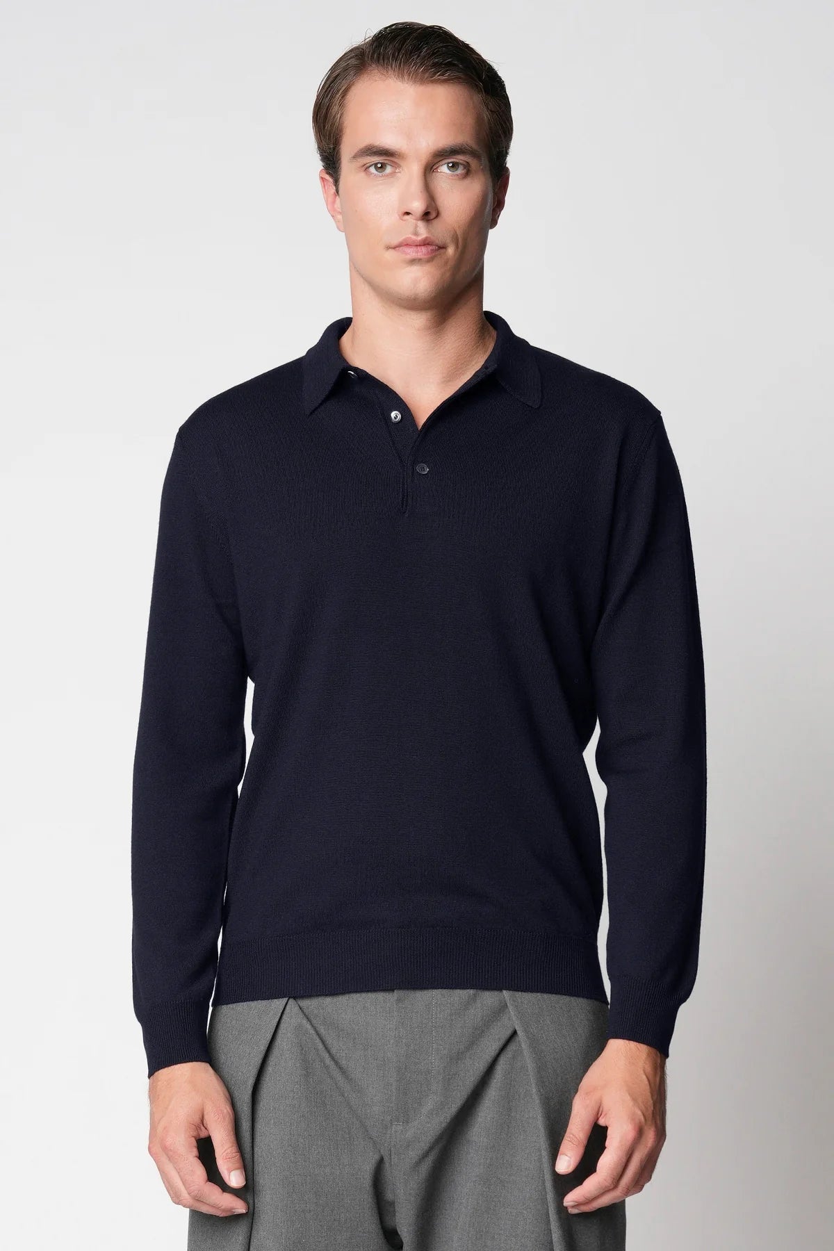 Polo bottoni rasato in lana merino extrafine